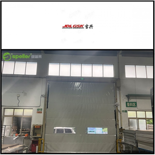 无锡吉兴汽车饰件有限公司仓库安装抗风堆积门