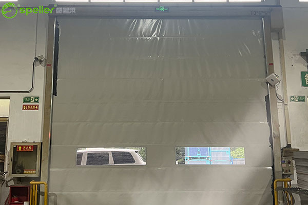 无锡吉兴汽车饰件有限公司仓库安装抗风堆积门